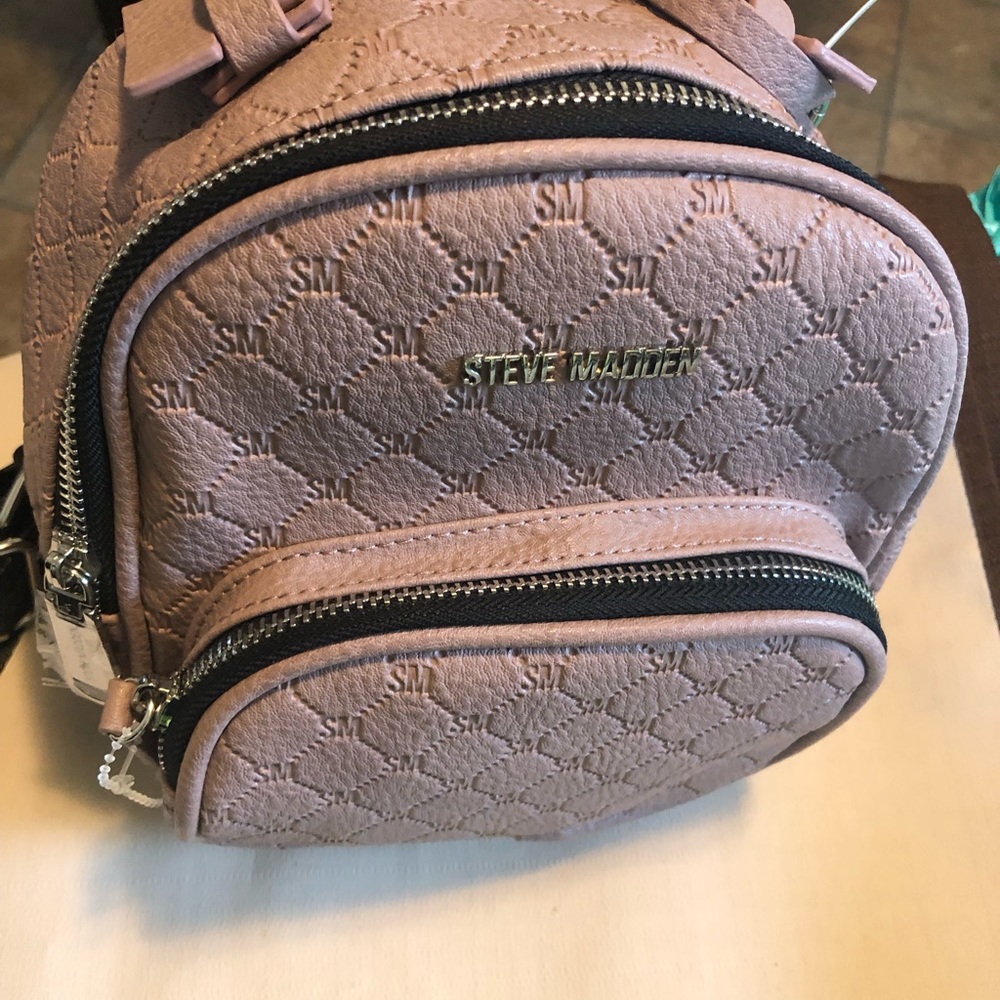 New Steve Madden Backpack
9x8 straps included